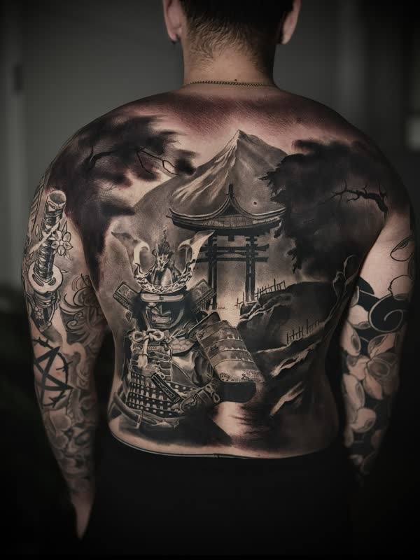 Full back piece of a samurai, torii gate and temple in Japanese style